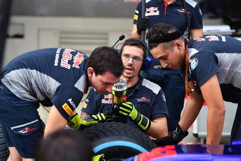 What Does a Formula 1 Pit Stop Crew Member Do?